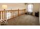 Spacious loft with carpeted floors at 701 Danver Ln, Beech Grove, IN 46107