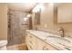 A luxurious bathroom offers double sinks, granite counters, and a tiled glass shower at 7023 Steinmeier W Dr, Indianapolis, IN 46220