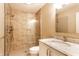 Bathroom featuring a tiled shower and granite vanity top at 7023 Steinmeier W Dr, Indianapolis, IN 46220