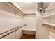 A well-organized walk-in closet features custom shelving and ample storage space at 7023 Steinmeier W Dr, Indianapolis, IN 46220
