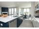 Gourmet kitchen with a center island and stainless steel appliances opens to a breakfast nook and Gathering room at 7313 Deerberg Dr, Indianapolis, IN 46259