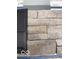 Selection of exterior finishes, including siding, trim, and stone veneer samples at 7313 Deerberg Dr, Indianapolis, IN 46259
