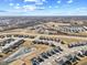 An aerial view showcasing a vibrant residential community with scenic ponds, tree-lined streets, and meticulously designed homes at 8673 Laurelton Pl, Brownsburg, IN 46112
