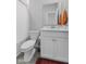 Bright bathroom with a white vanity and shower at 8673 Laurelton Pl, Brownsburg, IN 46112