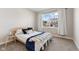 Cozy bedroom featuring a large window with natural light and views of the neighborhood at 8673 Laurelton Pl, Brownsburg, IN 46112