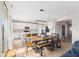 Inviting kitchen and dining area featuring a large dining table and modern appliances, great for Gathering gatherings at 8673 Laurelton Pl, Brownsburg, IN 46112