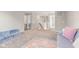 Spacious upstairs loft area with seating, ideal for relaxation or play at 8673 Laurelton Pl, Brownsburg, IN 46112