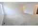 Large bedroom with neutral carpet and multiple entryways provides a spacious, versatile area at 9207 Foudray N Cir, Avon, IN 46123