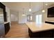 Open concept, modern kitchen features an island and easy access to dining spaces at 9207 Foudray N Cir, Avon, IN 46123