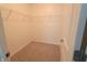 Walk-in closet with carpeted floor, wire shelving, and ample storage space at 9207 Foudray N Cir, Avon, IN 46123