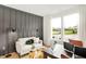 Bright living room filled with natural light with neutral decor and views to the outdoors at 9375 Abner St, McCordsville, IN 46055