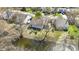 Aerial view of the house and waterfront with mature trees at 9526 Colony Pointe E Dr, Indianapolis, IN 46250