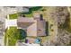 Aerial view showcasing home with back deck and waterfront views at 9526 Colony Pointe E Dr, Indianapolis, IN 46250
