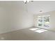 Spacious bedroom with neutral carpet, ample natural light and a large window at 9526 Colony Pointe E Dr, Indianapolis, IN 46250