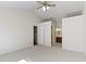 Bright bedroom with vaulted ceilings, bathroom access and a ceiling fan at 9526 Colony Pointe E Dr, Indianapolis, IN 46250