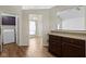 Updated kitchen area providing access to laundry room and the dining room at 9526 Colony Pointe E Dr, Indianapolis, IN 46250