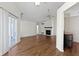 Open-concept living room with vaulted ceiling, fireplace and sun room at 9526 Colony Pointe E Dr, Indianapolis, IN 46250