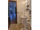 Cozy bathroom with a stand-alone sink at 1 Lenora Ave, Indianapolis, IN 46231