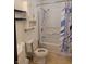 Clean bathroom with a shower-tub combo and a sink at 1 Lenora Ave, Indianapolis, IN 46231