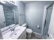 Bathroom featuring a bright vanity and a modern glass-enclosed shower at 103 N Nebraska St, North Salem, IN 46165