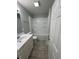 Updated bathroom featuring new fixtures and updated tile at 103 N Nebraska St, North Salem, IN 46165