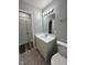 Bathroom with a modern vanity and a linen closet at 103 N Nebraska St, North Salem, IN 46165