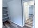 Spacious walk-in closet with built-in shelving and ample room for organization at 103 N Nebraska St, North Salem, IN 46165
