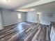 Open living room featuring sleek, modern flooring and neutral paint, perfect for entertaining at 103 N Nebraska St, North Salem, IN 46165