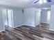 Open-concept living room features sleek flooring and neutral paint at 103 N Nebraska St, North Salem, IN 46165