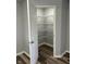 Walk-in pantry features adjustable wire shelving for optimal storage and organization at 103 N Nebraska St, North Salem, IN 46165