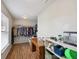 Functional room with wood floors, built-in shelving, and closet storage space at 10881 August Dr, Ingalls, IN 46048