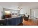 Cozy living room with hardwood floors, ceiling fan, and comfortable seating at 10881 August Dr, Ingalls, IN 46048