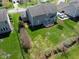 Aerial view shows a large, well-kept backyard and fence that provide privacy and space for outdoor enjoyment at 11014 Woodpark Dr, Noblesville, IN 46060