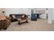 Finished basement featuring comfortable seating and a gaming area at 11014 Woodpark Dr, Noblesville, IN 46060