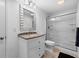 Updated bathroom with granite countertop vanity and glass shower enclosure at 11014 Woodpark Dr, Noblesville, IN 46060