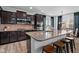 Kitchen with an island, stainless steel appliances, and pendant lighting at 11014 Woodpark Dr, Noblesville, IN 46060