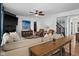 Spacious living room with hardwood floors, a fireplace, and comfortable seating at 11014 Woodpark Dr, Noblesville, IN 46060