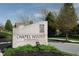Elegant entrance sign for Chapel Woods of Noblesville, surrounded by manicured landscaping and greenery at 11014 Woodpark Dr, Noblesville, IN 46060