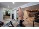 Basement featuring wood accent wall, carpet floors, an exercise area, and a punching dummy at 1123 Barley Cir, Carmel, IN 46032