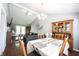 Elegant dining room with decorative hutch and a view into the living room, perfect for entertaining at 1123 Barley Cir, Carmel, IN 46032