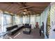 Inside of gazebo with a ceiling fan, sectional seating, privacy lattice, and curtains at 1123 Barley Cir, Carmel, IN 46032
