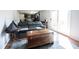 Inviting living room showcasing a comfortable sofa and a glimpse into the adjacent modern kitchen at 1123 Barley Cir, Carmel, IN 46032