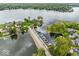 Scenic aerial view of waterfront homes and boat slips along a tranquil lake at 12304 Ridgeside Rd, Indianapolis, IN 46256