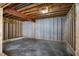 Partially framed basement with open ceiling, offering a blank canvas for various design possibilities at 12304 Ridgeside Rd, Indianapolis, IN 46256