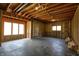 Unfinished basement with two windows, ready for your customization and expansion ideas at 12304 Ridgeside Rd, Indianapolis, IN 46256
