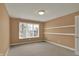 Neutral bedroom with a large window that provides natural light at 12304 Ridgeside Rd, Indianapolis, IN 46256