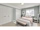Cozy bedroom boasts large closets, soft carpet, and a beautiful double-hung window at 12304 Ridgeside Rd, Indianapolis, IN 46256