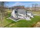 Aerial view of large gray home and backyard in established neighborhood at 12536 Lowery Way, Fishers, IN 46037