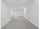 Bright, empty basement space with carpeted floors and recessed lighting at 12536 Lowery Way, Fishers, IN 46037
