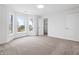 Spacious bedroom with neutral carpet and bright windows providing outside view at 12536 Lowery Way, Fishers, IN 46037